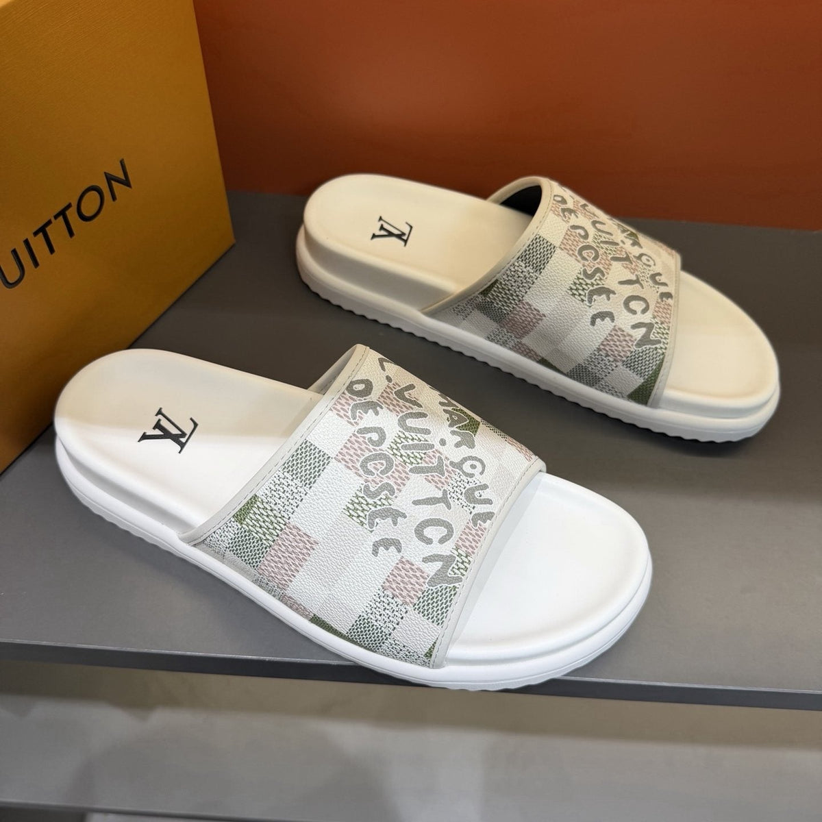 Louis Vuitton Patterned Strap Slides — front