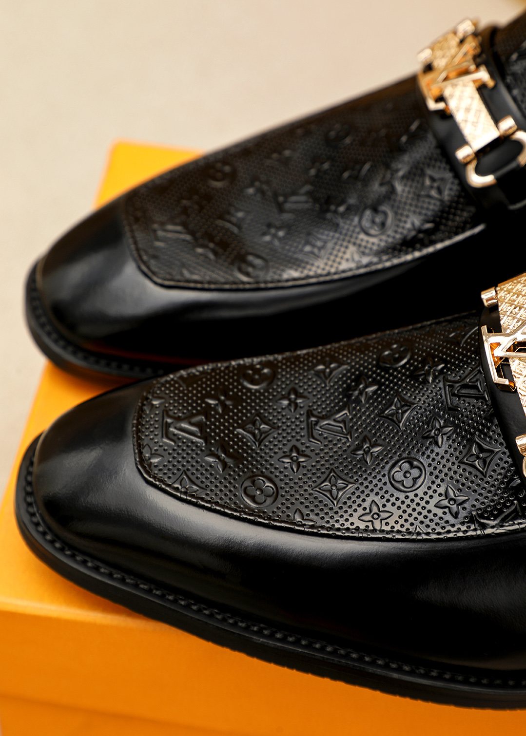 Louis Vuitton Embossed Buckle Loafers — detail