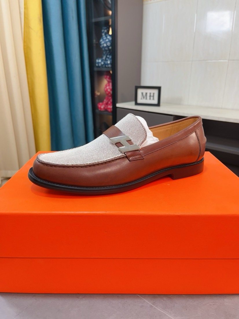 Hermès Textured Contrast-Trim Loafers — front